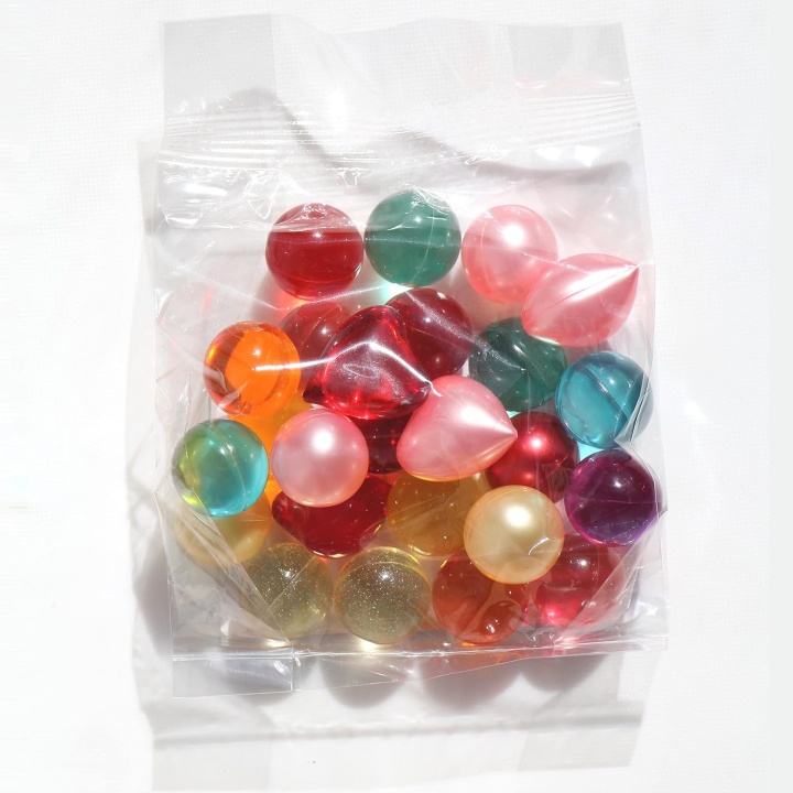 Wholesale Seaweed Rose Coconut Bath Oil Beads Spa Moisturizing Essential Oil Pearl Bath Beads For Dry Skin With Milk Rose Smell
